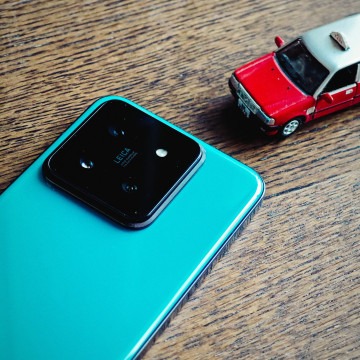 Лимитки Xiaomi 14 под Xiaomi Car SU7 на крупной подборке фото и видео